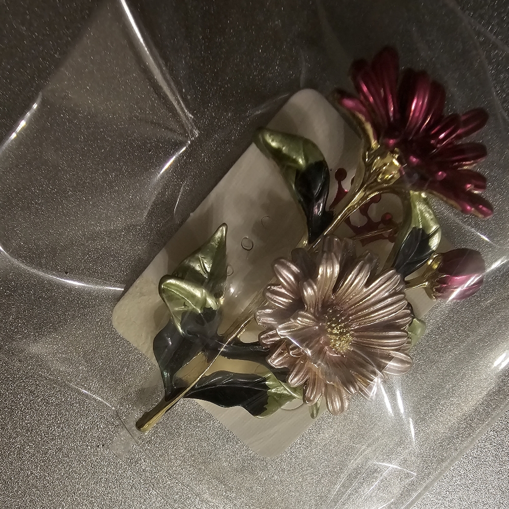 Brooch.
